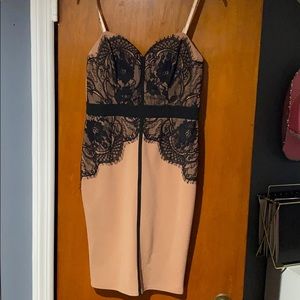 Beige dress with black lacing